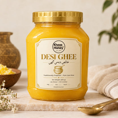 Khaas Honey pure desi cow ghee in a glass jar with a gold lid